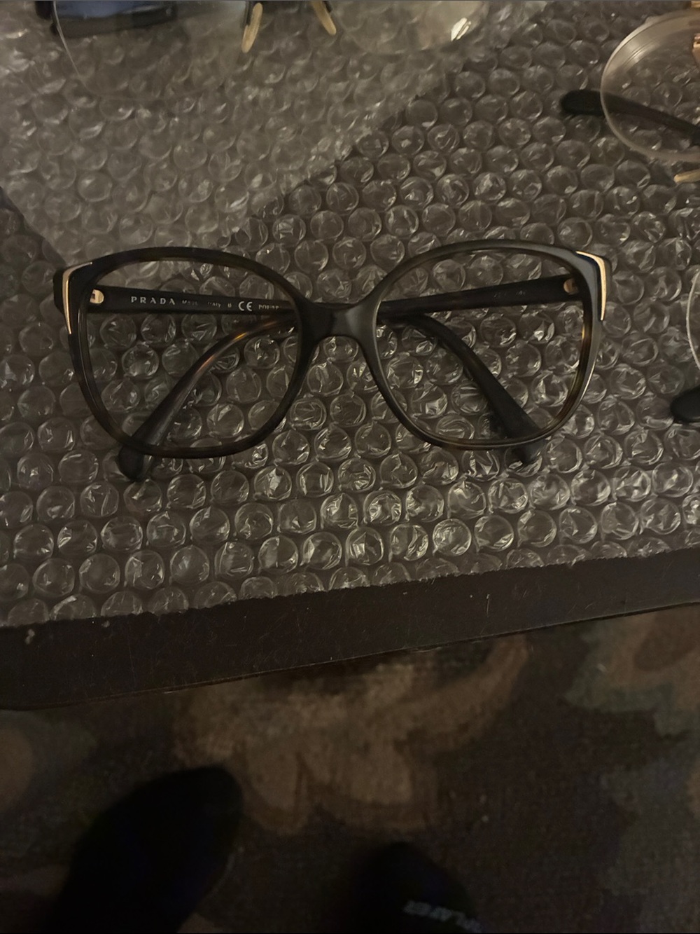 Prada Women's Black Cat-Eye Optical Glasses with Gold Accents
